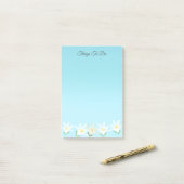 Witte Amaryllisbloemen op Lichtblauwe Dingen Om Te Post-it® Notes (Op bureau)