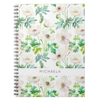 Witte anemonbloemen op room notitieboek