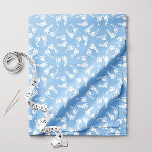 Witte babyvoetafdrukken op blauw stof