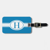Witte band en ovaalschild met monogram op blauw bagagelabel (Voorkant horizontaal)