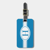 Witte band en ovaalschild met monogram op blauw bagagelabel (Voorkant verticaal)