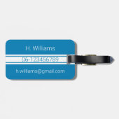 Witte band en ovaalschild met monogram op blauw bagagelabel (Achterkant horizontaal)