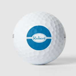 Witte band en ovale blauwe naam golfballen