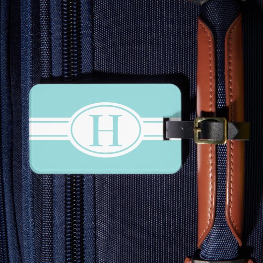 Witte band ovaal schild lichtblauw monogram bagagelabel (Voorkant Insitu 4)