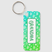 Witte blaadjes op groene Sleutelhanger (Voorkant)