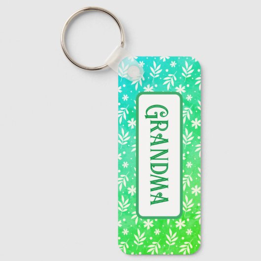 Witte blaadjes op groene Sleutelhanger (Voorkant)