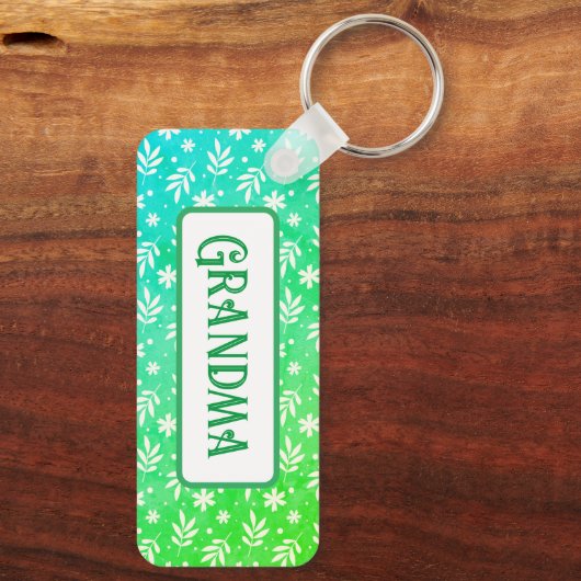 Witte blaadjes op groene Sleutelhanger (Achterkant)