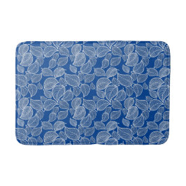 Witte bladeren op Blauwe Bath Mat