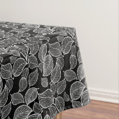 Witte bladeren op zwart tafelkleed (Voorbeeld)