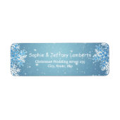 Witte blauwe sneeuwvlokken op blauwe kerst etiket (Voorkant)