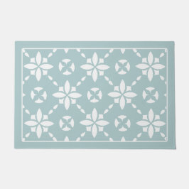 Witte bloem betegeld patroon op sage rand deurmat