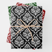 Witte bloemdamast op zwart, rood, groen inpakpapier vel (In situ)