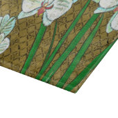 Witte bloemen en groene gedichten aan de bruine gr snijplank (Hoek)