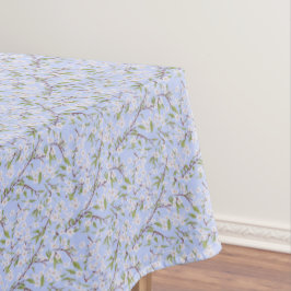 Witte bloemen op blauw tafelkleed