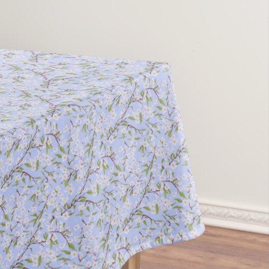 Witte bloemen op blauw tafelkleed (Voorbeeld)