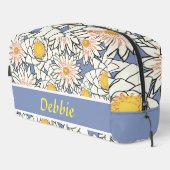 Witte bloemen op blauw toilettasje (Rechterhoek)