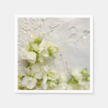 Witte bloemen op de oude kant