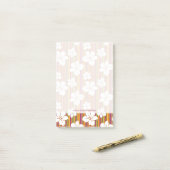 Witte bloemen op een gestreepte achtergrond post-it® notes (Op bureau)
