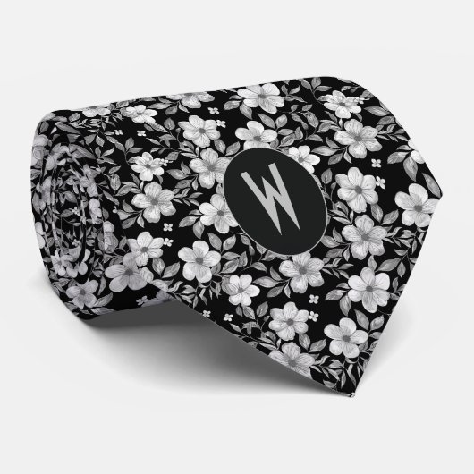 Witte bloemen op een zwarte stropdas (Opgerold)