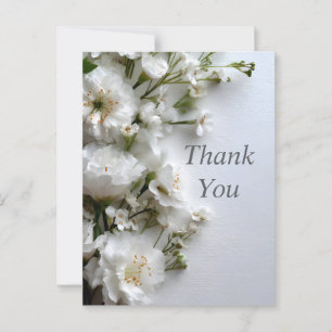 Witte bloemen op getextureerd papier bedankkaart briefkaart