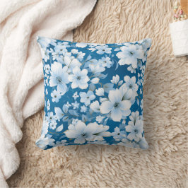 witte bloemen patroon, blauwe achtergrond, kussen