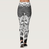 Witte bloemenkant: zwarte achtergrond. leggings (Achterkant)