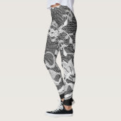 Witte bloemenkant: zwarte achtergrond. leggings (Links)