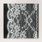 Witte bloemenkant: zwarte achtergrond. legpuzzel (Horizontaal)