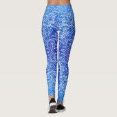 Witte bloemenpatroon print op blauw leggings (Achterkant)