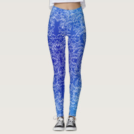 Witte bloemenpatroon print op blauw leggings