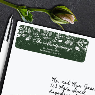 Witte botanicals op donkergroene retouradreslabels etiket