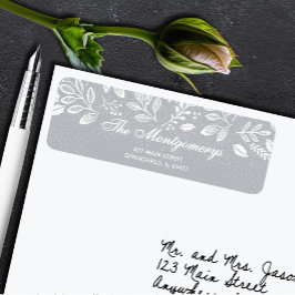 Witte botanicals op grijze retouradreslabels etiket