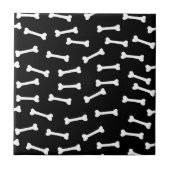 Witte botten op zwart tegeltje (Voorkant)