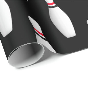 witte bowlingpennen op zwart cadeaupapier