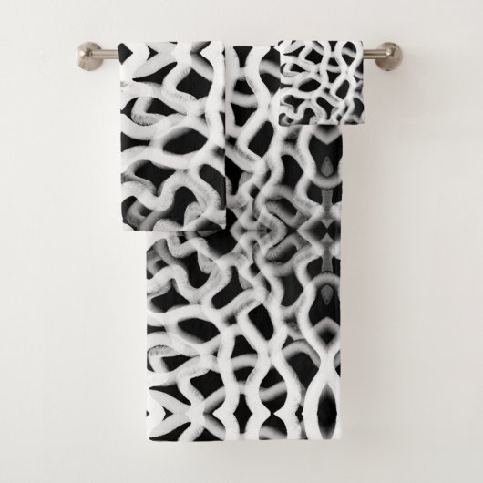 Witte buisleiding op zwart bad handdoek (Insitu)