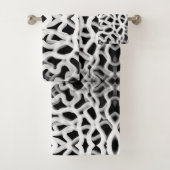 Witte buisleidingen op zwart bad handdoek (Insitu)