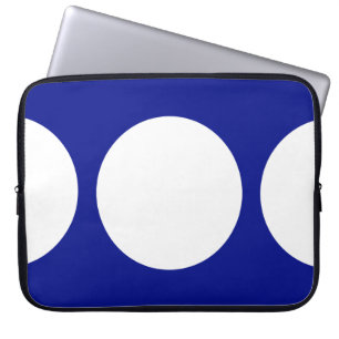 Witte cirkels op blauw laptop sleeve