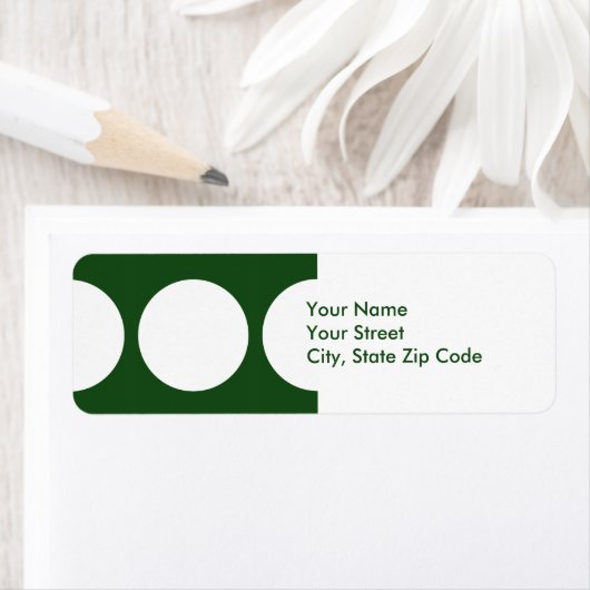 Witte cirkels op groen retouradres label (Insitu)