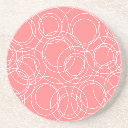 Witte cirkels op roze zandsteen onderzetter (Voorkant)