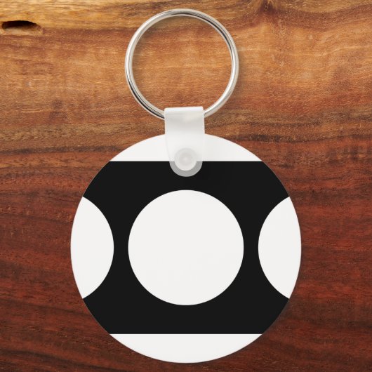 Witte cirkels op zwart sleutelhanger (Voorkant)