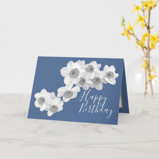 Witte deffodis tegen blauwe kleur achtergrond kaart (Gele Bloem)