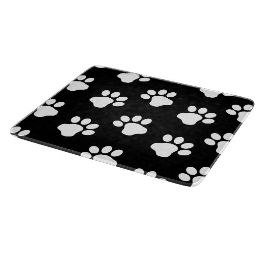 Witte doekjes verf afdrukken op zwart snijplank (Hoek)