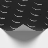 witte drijvende veer op zwart cadeaupapier (Hoek)