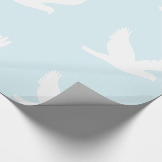 Witte duiven op blauw inpakpapier (Hoek)