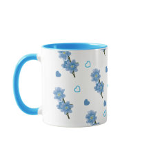 Witte en blauwe bloemencoffiemok