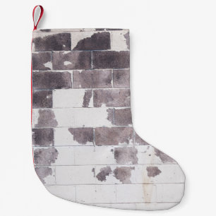 Witte en bruine betonwand kleine kerstsok
