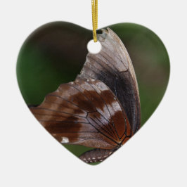 Witte en bruine vlinder op rode ventilator keramisch ornament