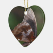 Witte en bruine vlinder op rode ventilator keramisch ornament (Links)