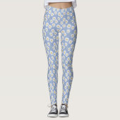 Witte en gele madeliefjes op stoffige blauwe achte leggings (Voorkant)