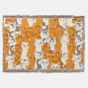 Witte en gember katten patroon groene ogen blauwe deken